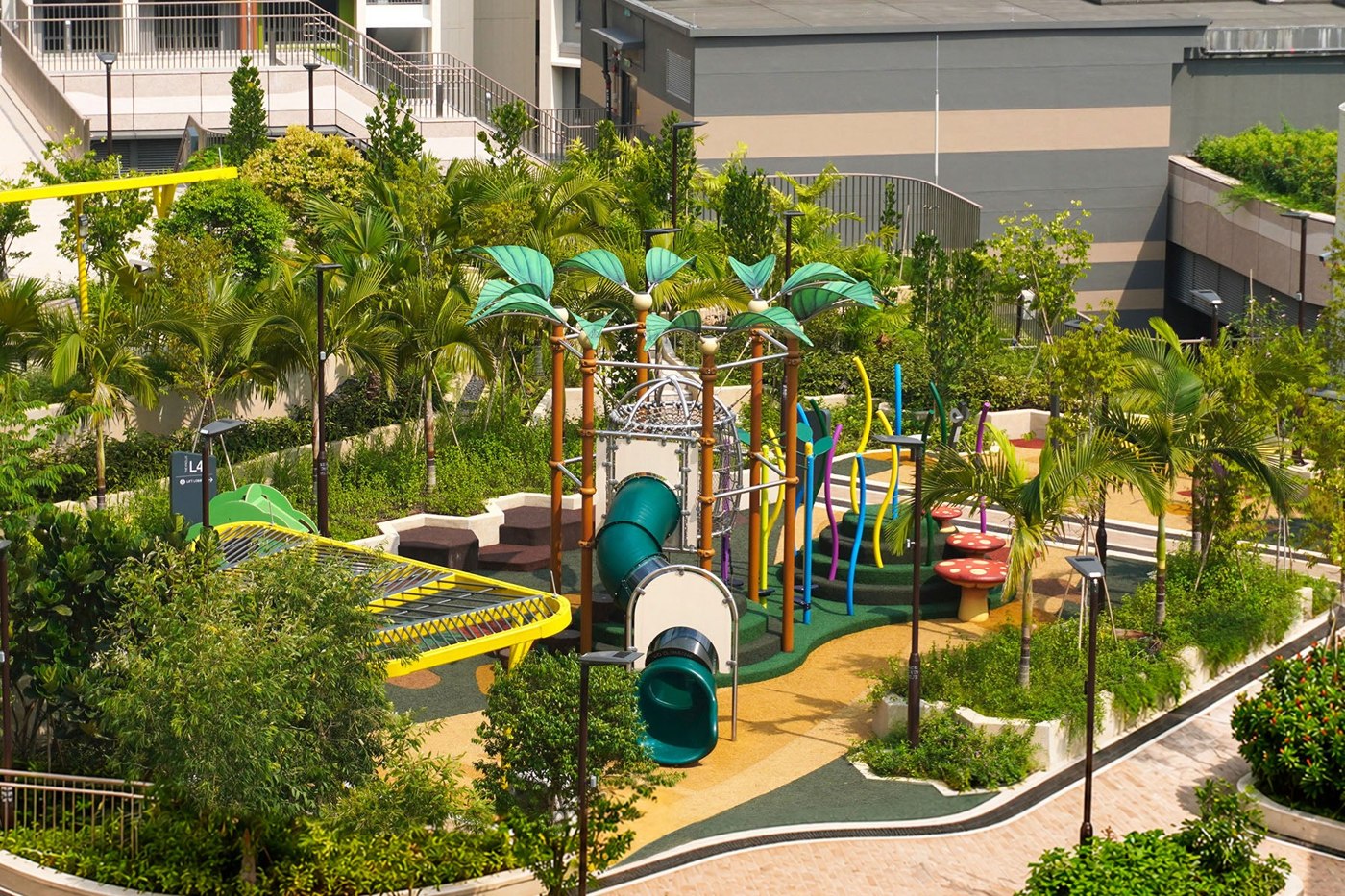 Palm-leaf climbing tower, tube slide and colourful stepping elements at Parc Point.