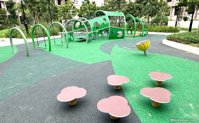 Green pepper-leaf obstacle structures and balancing steps at Plantation Village.