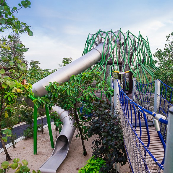 Treehouses and slides in the Gardens by the Bay Children’s Garden