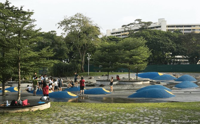 Water channels and blue play mounds at Bishan–Ang Mo Kio Park Water Playground